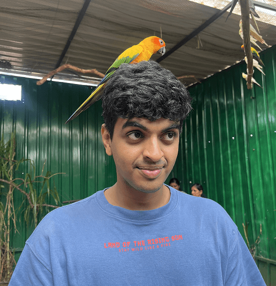 Raj with a parrot