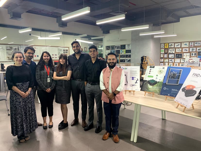 Raj with a team at an exhibition